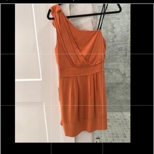 BCBG mini/off shoulder, orange, lined dress. Never worn. No issues.